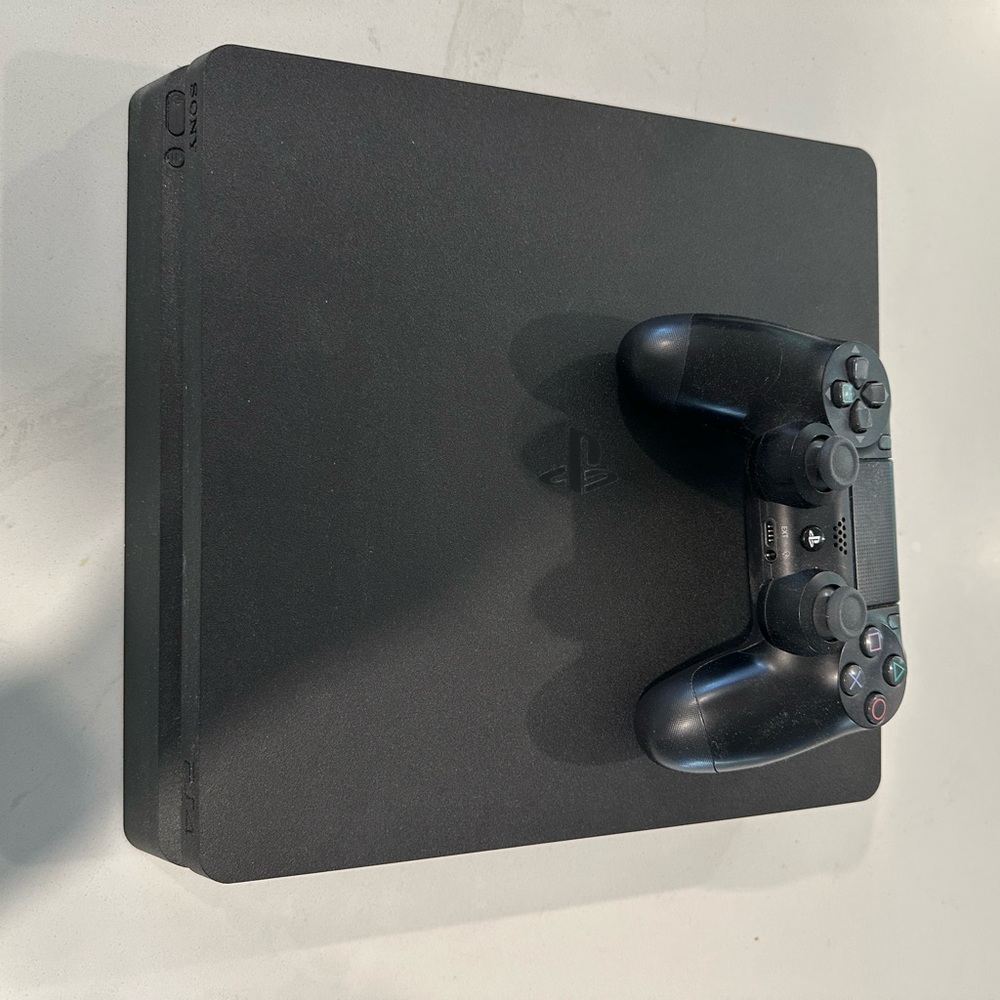Sony Black Gaming Console with Controller